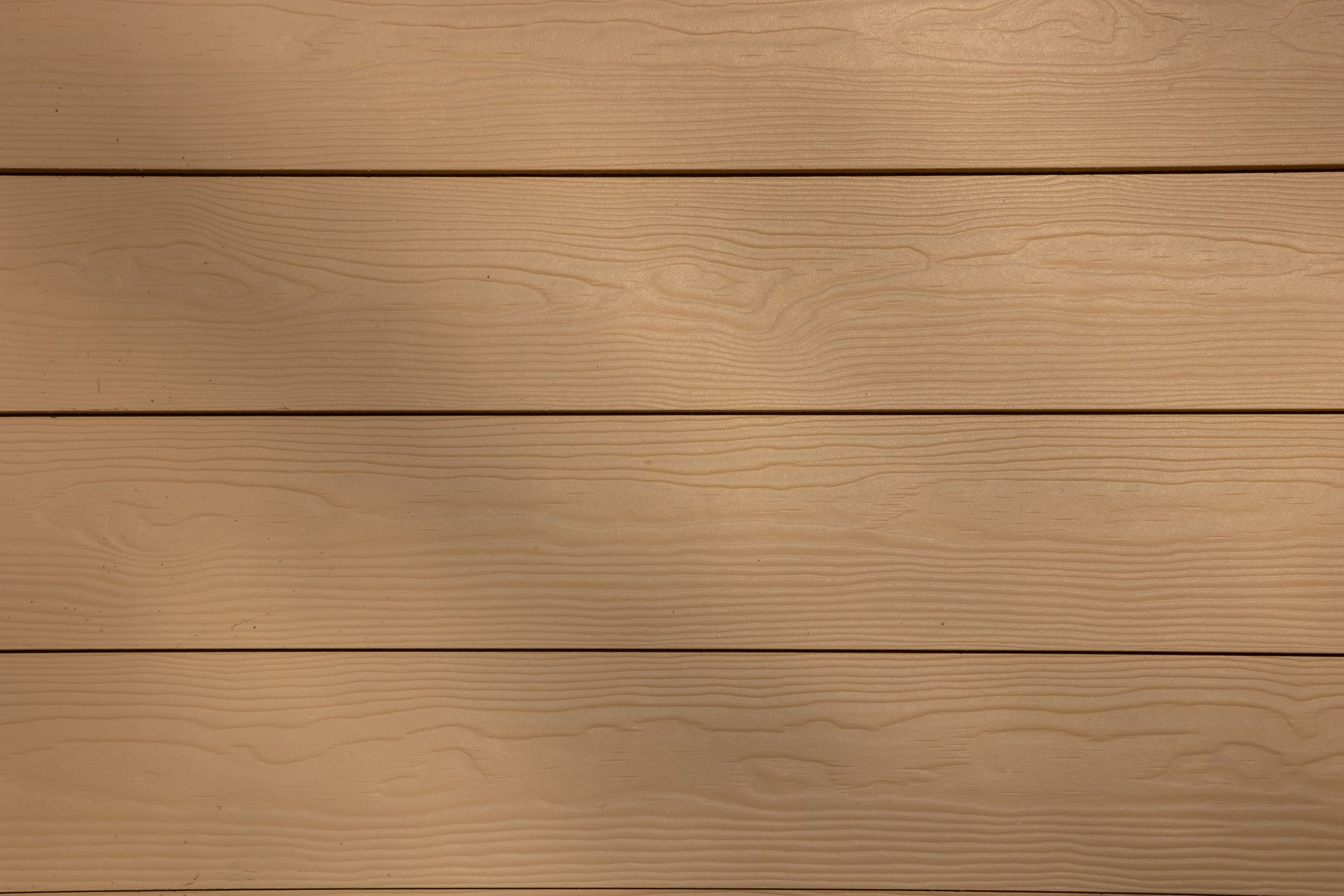 Straight lines of beige vinyl siding with shadows on the wall, wooden surface imitation, modern house reconstruction way, background